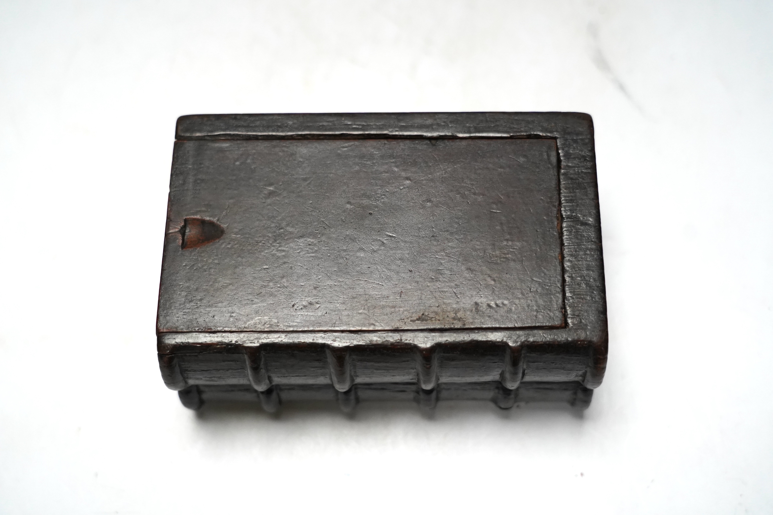 A 19th century novelty treen coin box in the form of two antiquarian books, 15.5cm